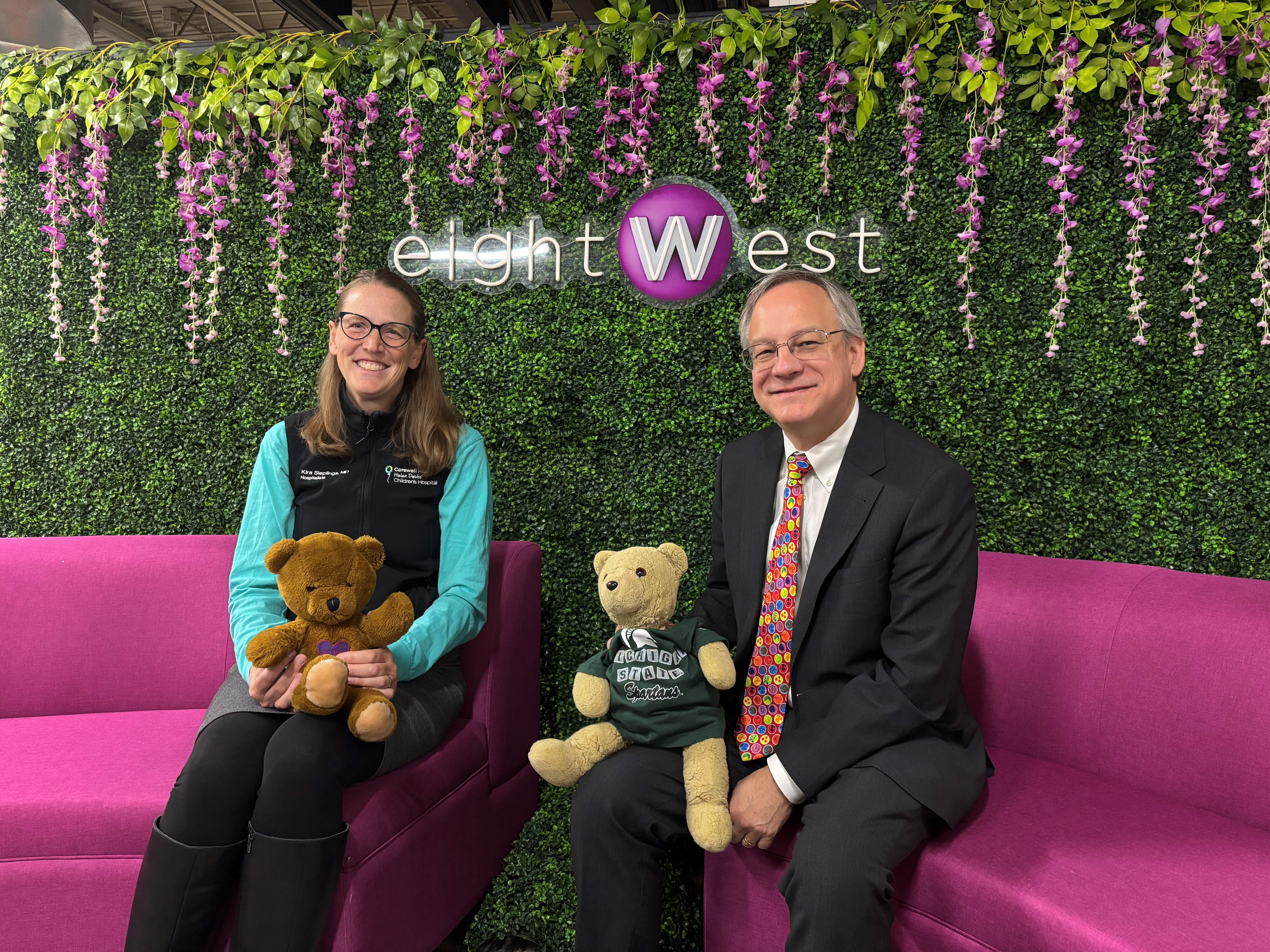 Above: Kira Sieplinga, MD, pediatrician, Corewell Health and Kira Bear with Aron and Hope Bear in the green room before appearing on WOOD TV’s eightWest to promote the Teddy Bear Health Fair, Saturday, 9 a.m. – noon at Garfield Park in Grand Rapids.  Friends,  It has been another big week for the College of Human Medicine. The Secchia Center was decked out for its 15th anniversary celebration. For the last few weeks, we have been doing town halls about our expansion in Grand Rapids including building the Secchia Center as the headquarters of the College of Human Medicine.  There were about 150 city leaders and donors at the event Wednesday evening, including Carol Van Andel; Grand Rapids City Manager Mark Washington; MSU President Kevin Guskiewicz; Dave Porteous, who was chair of the Michigan State University Board of Trustees during the expansion; Corewell Health President and CEO Tina Freese Decker, who worked on the earliest of the expansion agreements; and Mark Secchia, son of Joan and Peter Secchia. In return for the $90 million in community support ($50 million from Corewell, nee’ Spectrum) for the new building, the university agreed to place the headquarters of the College of Human Medicine in Grand Rapids on the Medical Mile. Since then, the community has invested another $30 million in the Grand Rapids Research Center, nearly $20 million in support of the Doug Meijer Medical Innovation building, and more than $20 million in support for research and education.  In return for the community support, the college and university have been excellent partners, investing in education, research and community engagement that yields an average of $300 million a year in economic activity in the city. The partnerships go beyond money, as new discoveries have created destination clinical programs, expanded residencies and fellowships, and nearly tripled the number of college students staying in Grand Rapids for their residency and fellowship.  The Secchia Center was abuzz for the anniversary event, and there was a lot of media interest as well. Our events and communications teams have been crushing it. The Flint ribbon cutting was a brilliant event with great news coverage, and the Secchia anniversary was all I could have hoped. This Saturday is our third, and final, Teddy Bear Health Fair of the year. I want to recognize Melissa Veneklase, events manager; Emily Linnert, senior public relations manager; Amy Nienhouse, MS, senior communications and marketing officer; Megan Barber, facility conference/event coordinator; and our entire External Relations, Communications, and Operations and Facilities teams for all their work on these events. People do not know what we do if we do not tell them. In one other piece of news, last week was the launch of the Michigan State University Primary Care Research Collaborative (MSU-PCRC) Research Training Fellowship Program. There are six fellows from six college-affiliated residencies: Gurbaksh Esch, MD, MPH, FAAP, Hurley Medical Center – Flint; Katrina Weirauch Engle, DO, University of Michigan Health–Sparrow – Lansing; Jenna Bernson, MD, MSU/MyMichigan Medical Center – Alma; Kate Shaffer, MD, FAAFP, Munson Medical Center – Traverse City; Uzma Khan, MD, McLaren Health Care – Flint; and L. Raquel Clary-Lantis, DO, UP Health System – Marquette. One of the great opportunities of our campus system has been its potential as a research network. Julie Phillips, MD, MPH, made a primary care practice-based research network a priority when she became chair. The fellows, program faculty, and network director Yasi Zamani-Hank, PhD, MPH, are developing research capacity in our residencies and communities. 